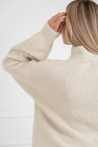 Moteriškas megztinis su vilna MELANIA Balta