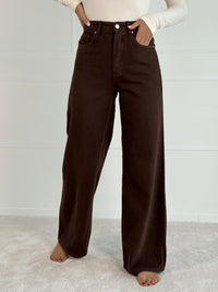 Platėjantys moteriški džinsai aukštu juosmeniu CHICAGO Ruda