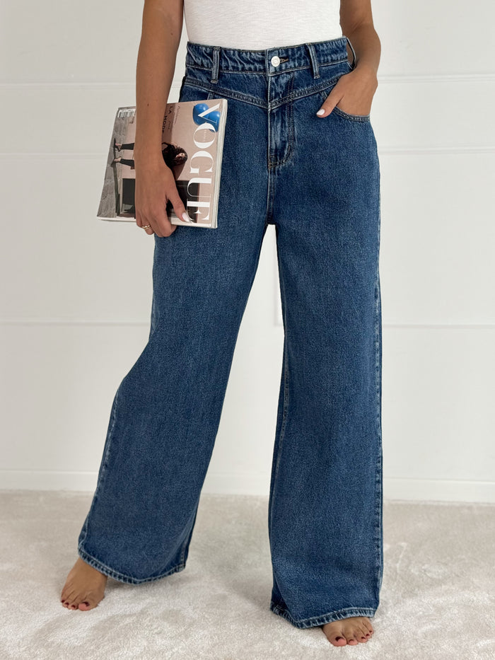 Platėjantys moteriški džinsai JAMAR Tamsiai mėlyna