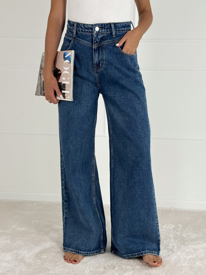 Platėjantys moteriški džinsai JAMAR Tamsiai mėlyna