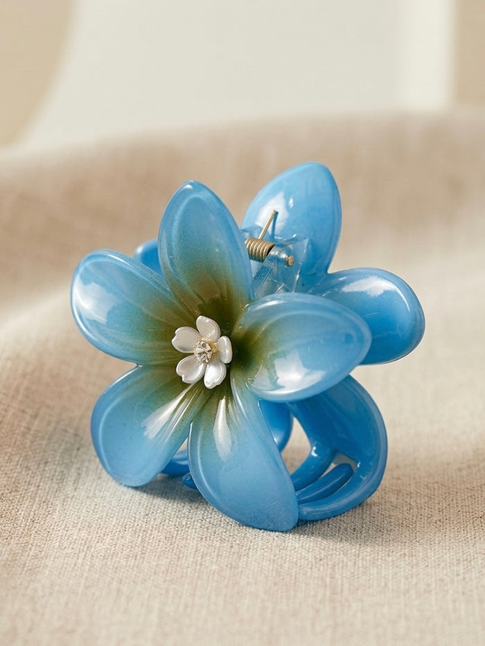 Gėlės formos plaukų segtukas CECILY Žydra