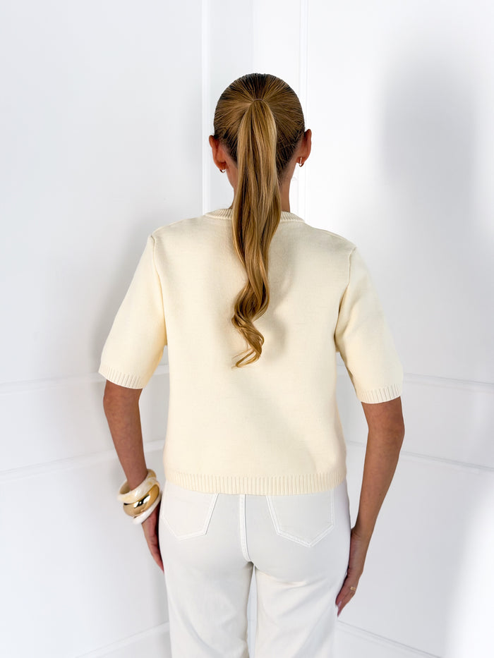 Moteriškas susagstomas megztinis su vilna NAYA Kreminė