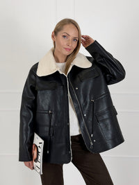 Moteriška eko odos striukė ELISEY Juoda