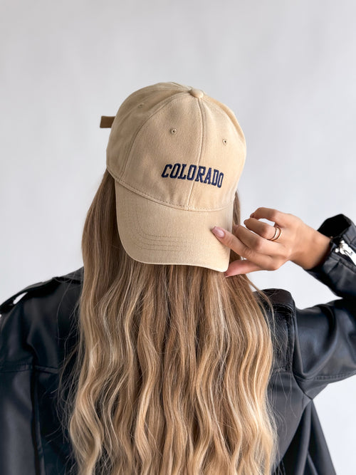 moteriska-kepure-su-snapeliu-colorado-kremine