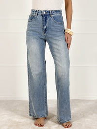 Platėjantys moteriški džinsai su siuvinėtomis gėlėmis LOIS Mėlyna