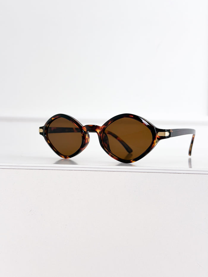 Moteriški saulės akiniai 112 Ruda