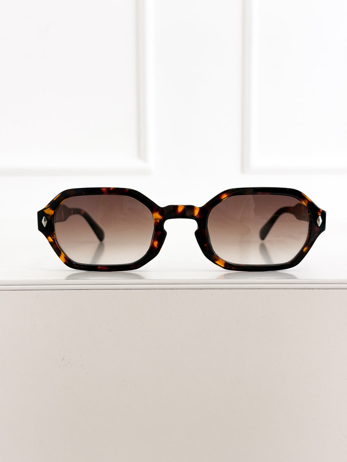 Moteriški saulės akiniai 111 Ruda