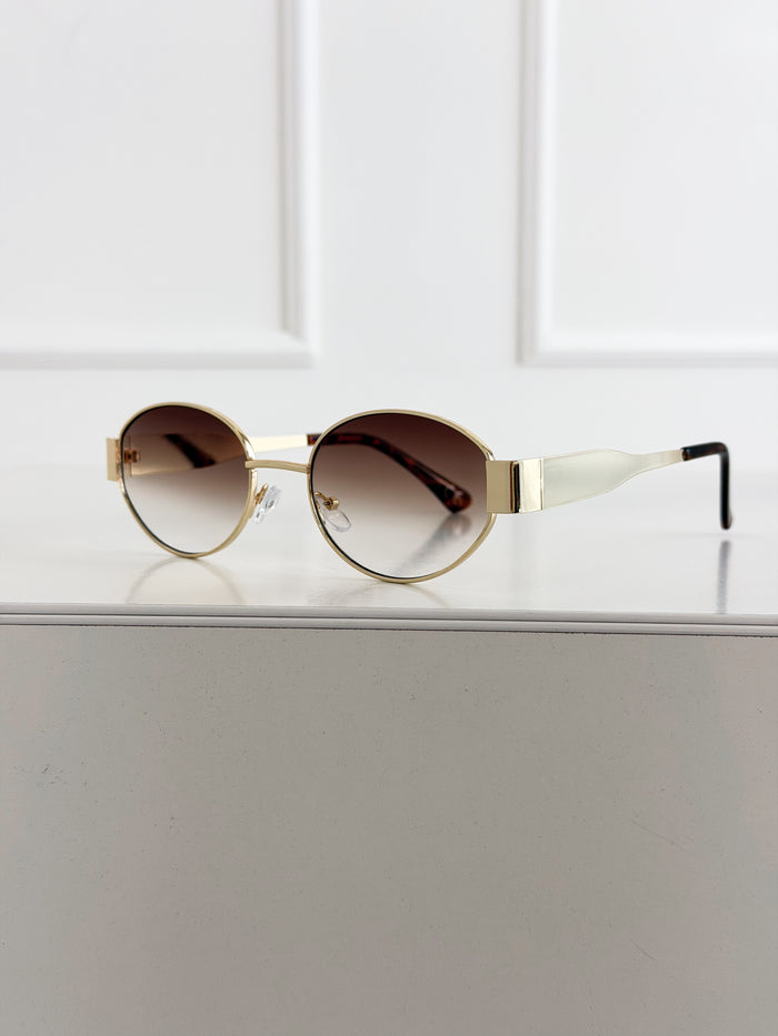 Moteriški saulės akiniai 109 Ruda